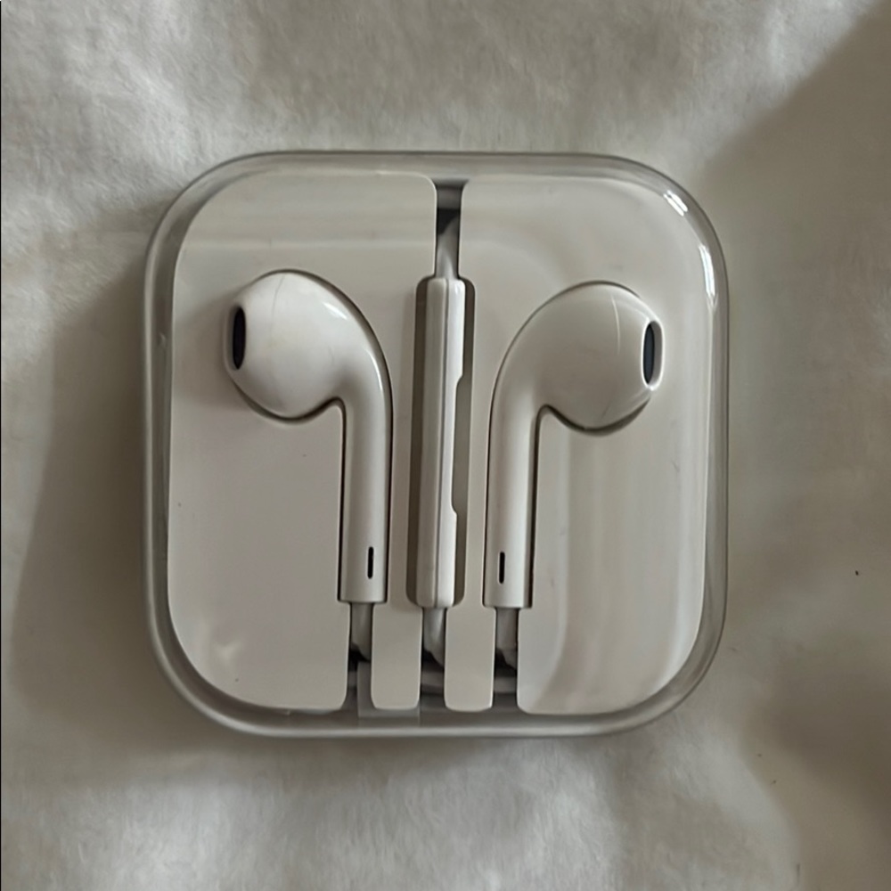Apple ear pods. With wires. Never used.